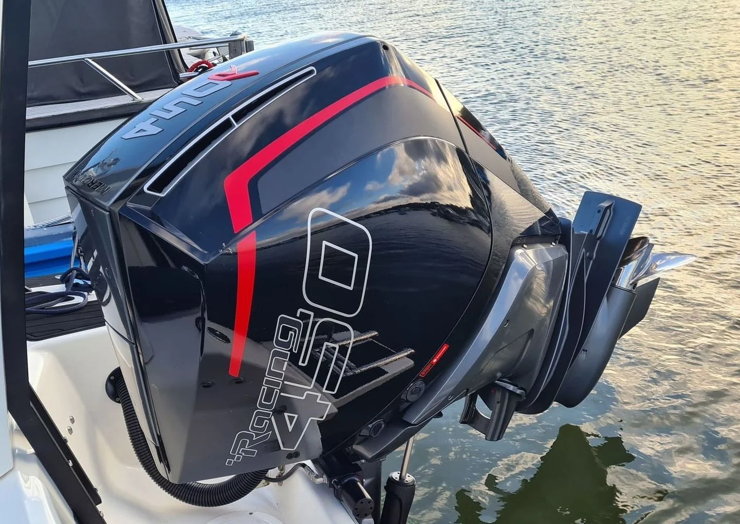 High-horsepower outboard motor mounted on recreational powerboat in Cape Coral waterway.