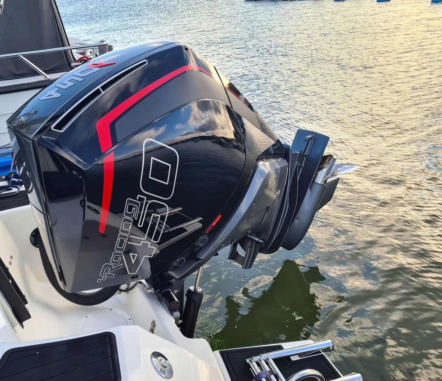 High-performance outboard motor mounted on recreational powerboat in Cape Coral canal waters.
